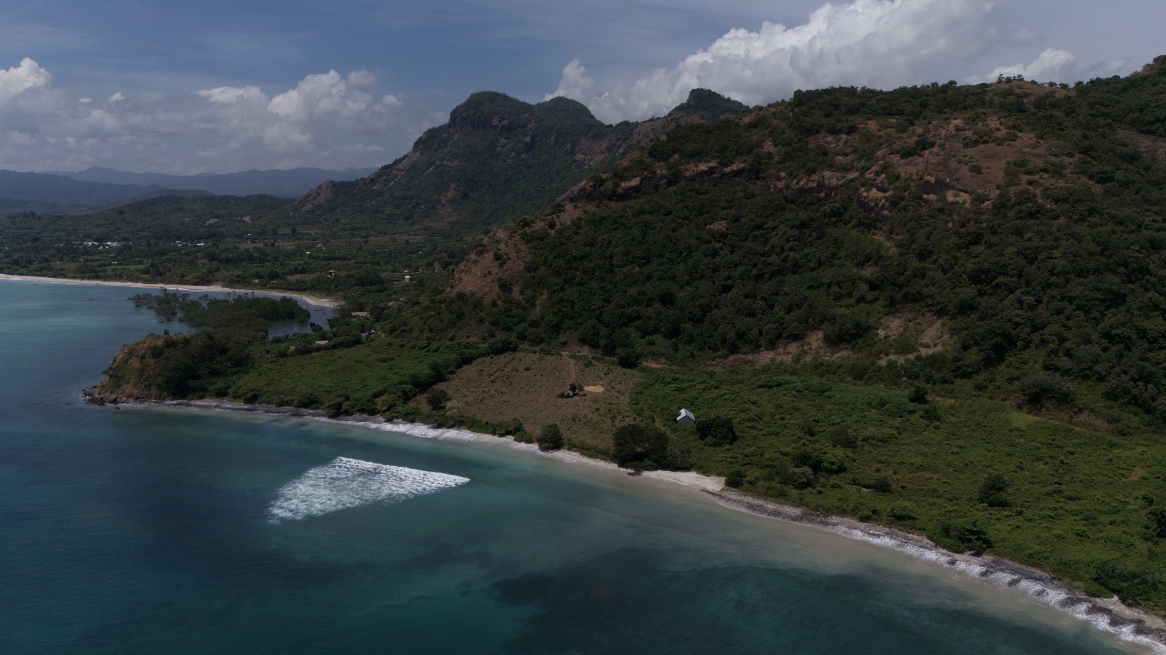 Aerial view of Jelenga bay and reef line near the Sumbawa land