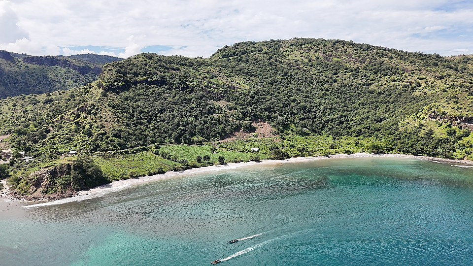 Tanahesia beachfront cove seen from the water